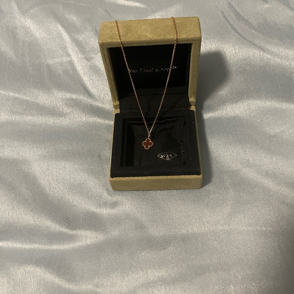 100% authentic Van Cleef and Arpels 18k rose gold carnelian necklace. Price firm